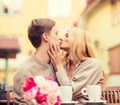 Romantic happy couple kissing in the cafe Royalty Free Stock Photo