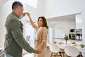 Romantic happy older mature couple in love dancing at home kitchen. Royalty Free Stock Photo