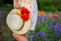 Romantic hat with bouquet of poppies Royalty Free Stock Photo