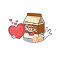 Romantic hazelnut milk cartoon picture holding a heart