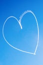 Romantic heart written in the sky by an aircraft Royalty Free Stock Photo