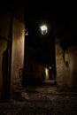 romantic historic old alley, in the old town of Malcesine in Italy in the late evening Royalty Free Stock Photo