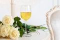 Romantic holiday composition with wine glass and roses for Valentines Day. Love, gift and spring holiday background. Royalty Free Stock Photo