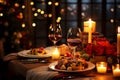 Romantic holiday table setting with glasses of wine, candles, roses and a Christmas tree in the background