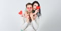 Romantic ideas celebrate valentines day. Man and woman couple in love hold red heart valentines cards white background Royalty Free Stock Photo