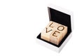 Romantic inscription of letters on light wooden cubes in white b Royalty Free Stock Photo