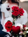 Romantic vibes with wine roses hearts.