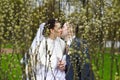 Romantic kiss bride and groom in park Royalty Free Stock Photo