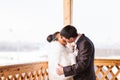 Romantic kiss happy bride and groom on winter wedding day Royalty Free Stock Photo