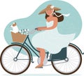 Romantic lady riding on a vintage bicycle with her dog in a basket