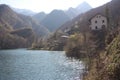 The romantic lake of Isola Santa in Tuscany, in the mountains of the Apuan Alps. panorama out of focus with a bit of mist Royalty Free Stock Photo
