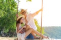 Romantic lifestyle asian couples lover playing an ukulele on the hammock. relax