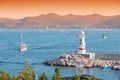 Lighthouse at the entrance to the bay and port of Kas on the Mediterranean coast of Turkey. Sea cruises and adventures Royalty Free Stock Photo