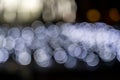 Romantic lights on Christmas decorations on black background. Defocused Royalty Free Stock Photo