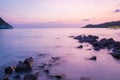 Romantic long exposure sea water beach during sunset