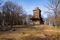 Romantic lookout tower Vlkova in beautiful magic spring forest, Czech Republic, sunny day, clear blue sky Royalty Free Stock Photo