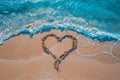 A romantic love heart drawn in the sand on a beautiful beach Royalty Free Stock Photo