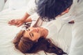 Romantic love of young couple in the bedroom.