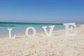 Romantic love sign on a tropical beach paradise Royalty Free Stock Photo