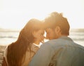 Romantic love, sunset and beach couple relax with summer sunshine, wellness and bonding on travel holiday in Greece Royalty Free Stock Photo