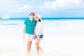 Romantic lovers vacation on a tropical beach.