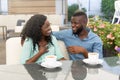 Romantic loving couple drinking coffee, having a date in the cafe