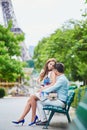 Romantic loving couple having a date near the Eiffel tower Royalty Free Stock Photo