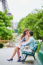 Romantic loving couple having a date near the Eiffel tower Royalty Free Stock Photo