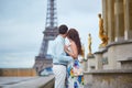 Romantic loving couple having a date near the Eiffel tower Royalty Free Stock Photo