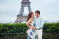 Romantic loving couple having a date near the Eiffel tower Royalty Free Stock Photo