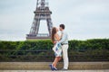 Romantic loving couple having a date near the Eiffel tower Royalty Free Stock Photo