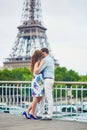 Romantic loving couple having a date near the Eiffel tower Royalty Free Stock Photo