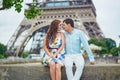 Romantic loving couple having a date near the Eiffel tower Royalty Free Stock Photo