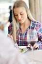 Romantic lunch in a fancy restaurant.couple sitting and eating at lunch time Royalty Free Stock Photo