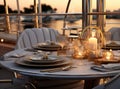 romantic lunch on motor yacht at sunset, Table setting at a luxury yacht. Created with Generative AI technology. Royalty Free Stock Photo