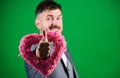 Romantic macho flirting. Happy valentines day. Hipster hold heart symbol love. Man formal suit celebrate valentines day