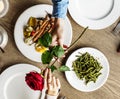 Romantic Man Giving a Rose to Woman on a Date Royalty Free Stock Photo