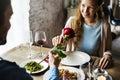 Romantic Man Giving a Rose to Woman on a Date Royalty Free Stock Photo