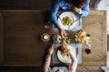 Romantic Man Giving a Rose to Woman on a Date Royalty Free Stock Photo