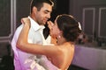 Romantic married couple bride and groom dancing at wedding reception in france