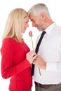 Romantic mature couple holding rose Royalty Free Stock Photo