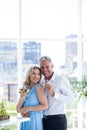 Romantic mature couple holding wine at restaurant Royalty Free Stock Photo