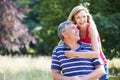 Romantic Middle Aged Couple Walking In Countryside Royalty Free Stock Photo