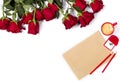 Romantic mockup. Beautiful bunch of large red roses, sheet of craft paper, color pencils, small cup of coffee and box with ring Royalty Free Stock Photo