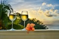 Romantic moments in summer at sunset with two glasses of white wine - Relaxing romantic holiday concept with beautiful view of Royalty Free Stock Photo