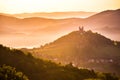 Romantic morning scenery - church with two towers on the top of the hill in beautiful warm summer morning light. Fairy tail photo Royalty Free Stock Photo