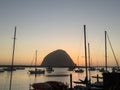 Romantic morro bay harbor sunset with morro rock Royalty Free Stock Photo