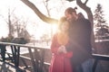 Romantic multiethnic couple in love hugging on the street Royalty Free Stock Photo