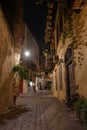 The romantic narrow alley Angelou in the old town of Chania lit by a lantern