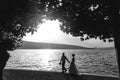 Romantic newlywed couple bride and groom at sunset beach near se Royalty Free Stock Photo